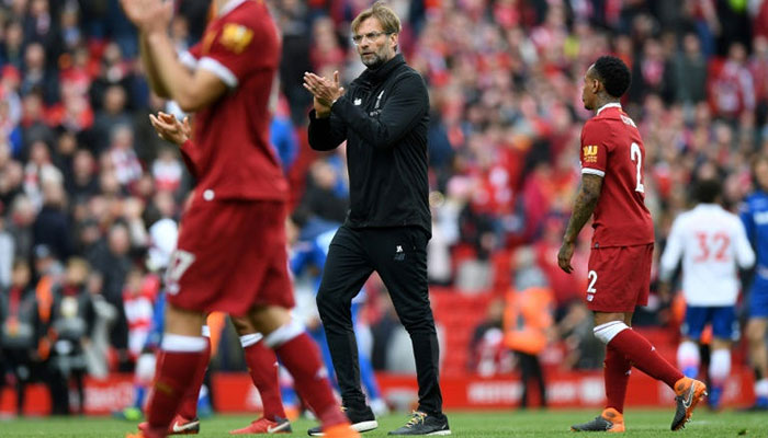Liverpool on brink of final as tensions mount in Rome