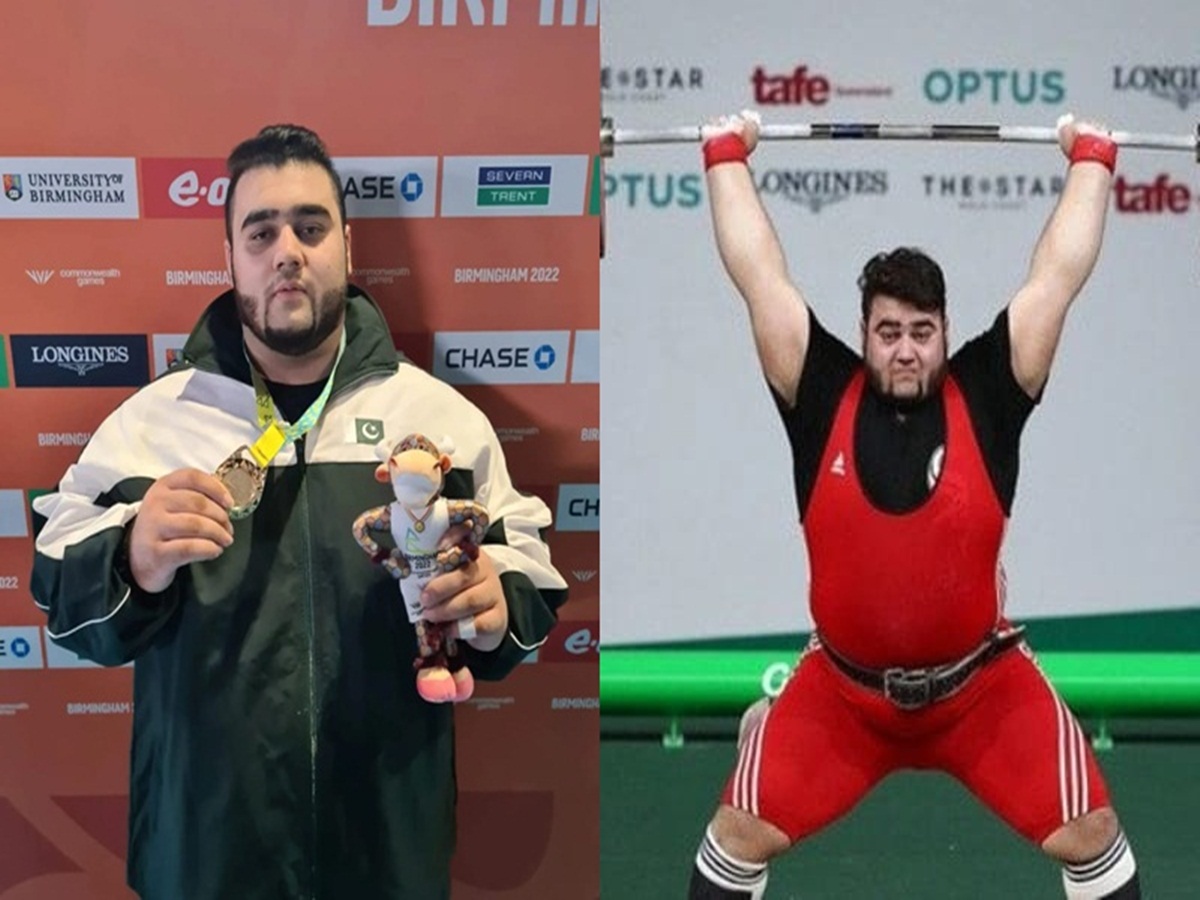 Director General Sports Punjab Muhammad Tariq Qureshi greets weightlifter Nooh Dastgir Butt for winning Pakistan’s first gold medal in the ongoing Commonwealth Games 2022